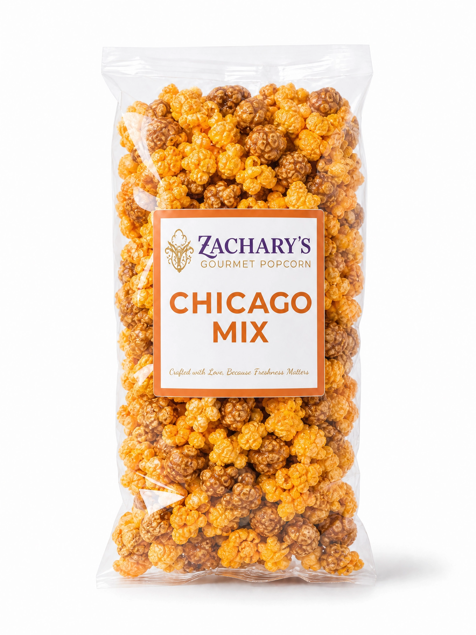 Bag of Zachary's Chicago Mix gourmet popcorn, caramel and cheddar kernel blend in a clear bag with orange and white label