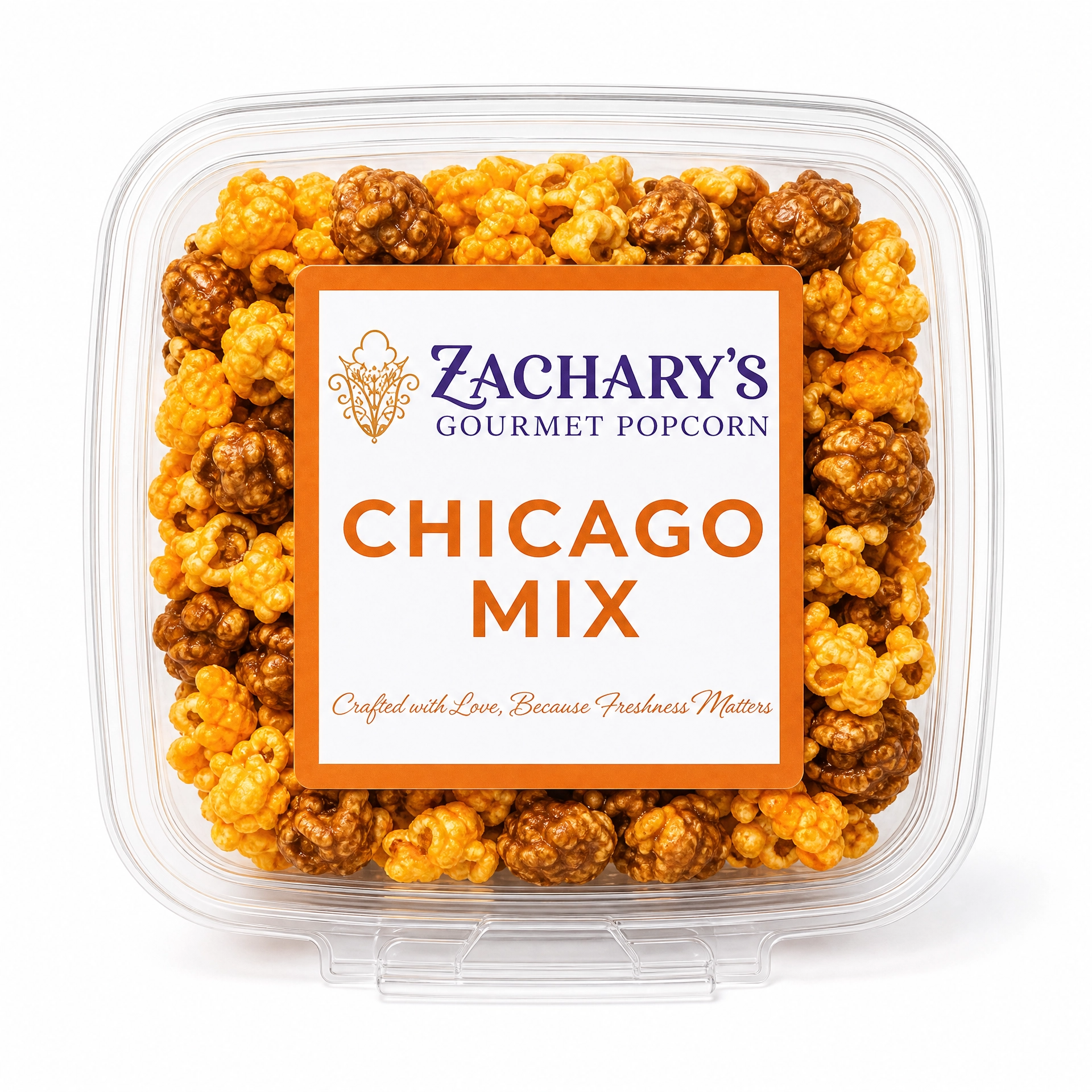 Close-up of Zachary's Chicago Mix gourmet popcorn in The Keeper resealable tub, caramel and cheddar kernel blend with orange and white label